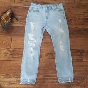 Light blue distressed high rise jeans